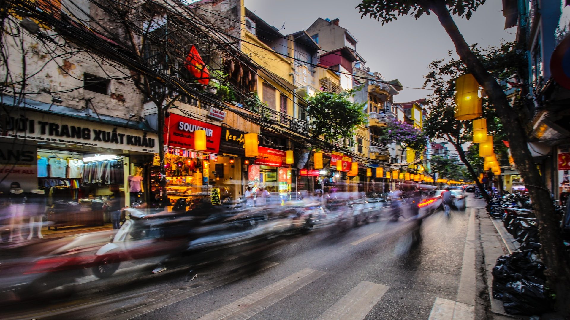 Vietnam's landscape street with traffic in front of company shops